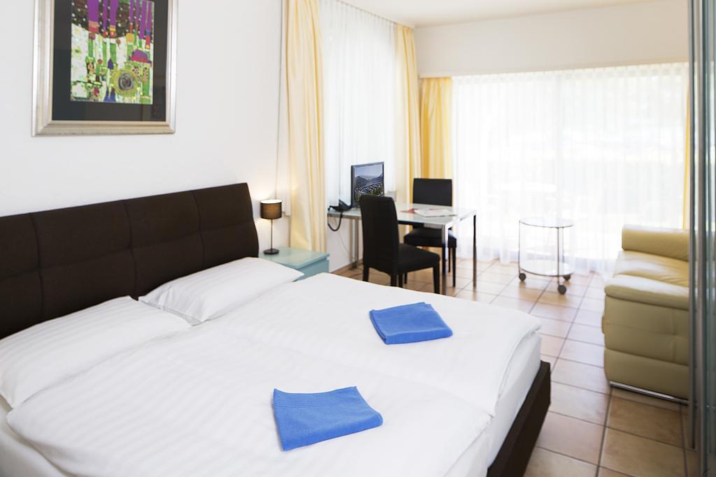 Aparthotel Al Lago Locarno Esterno foto