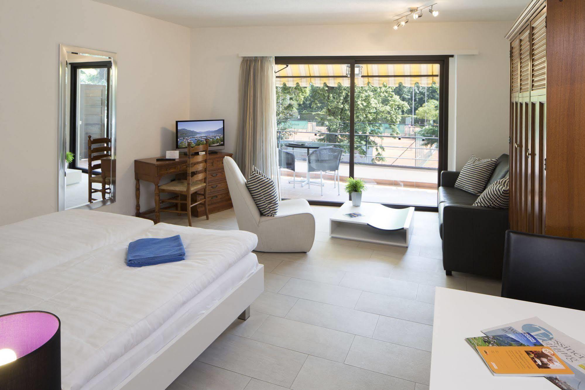 Aparthotel Al Lago Locarno Esterno foto